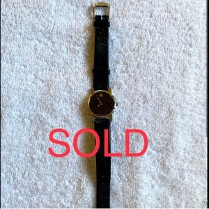 Movado black slim watch